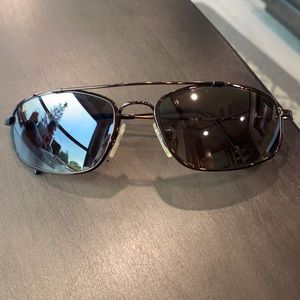 Maui Jim glasses.  Men/women metal frame and glass lens clean and no scratches.